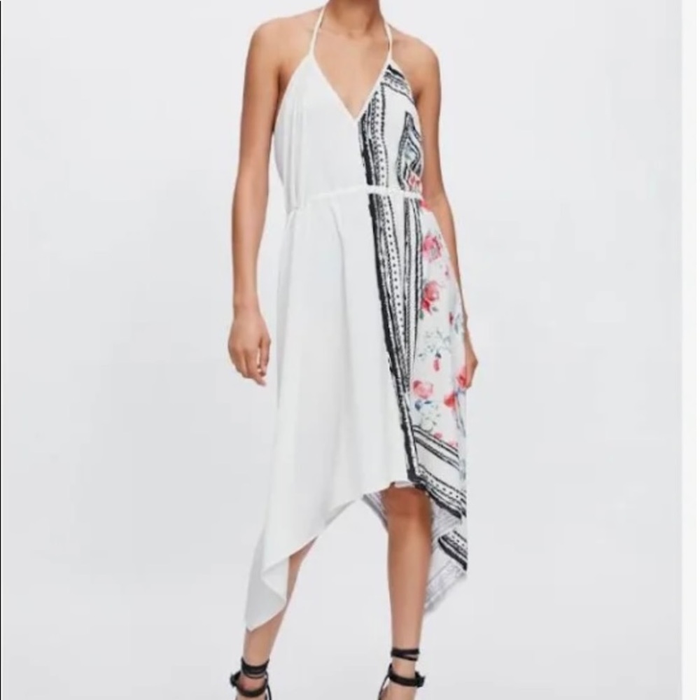 Women’s Zara Asymmetrical Dress with black + watercolor floral designs. Size S.